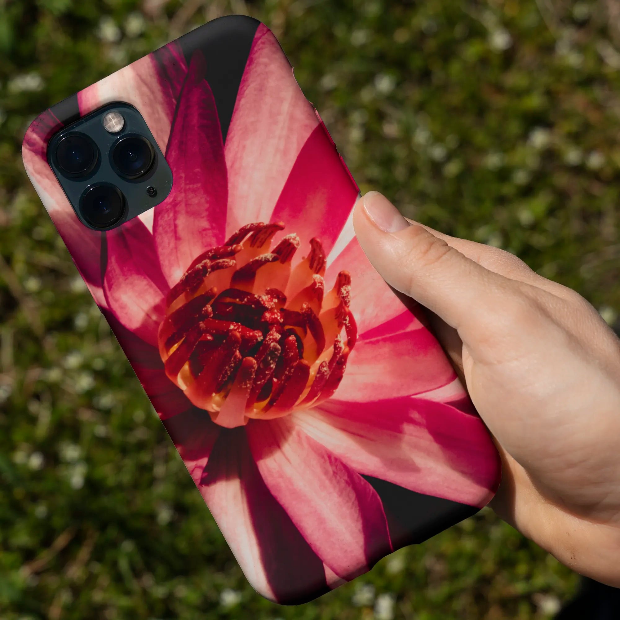 IPhone case featuring a vibrant pink flower design.