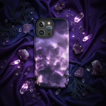 Purple iPhone case with an intricate white floral and vine pattern.