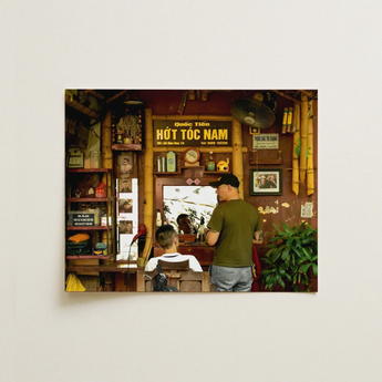 Small to Medium Wall Art, Framed canvas of a Vietnamese barbershop interior with vintage decor and signage.