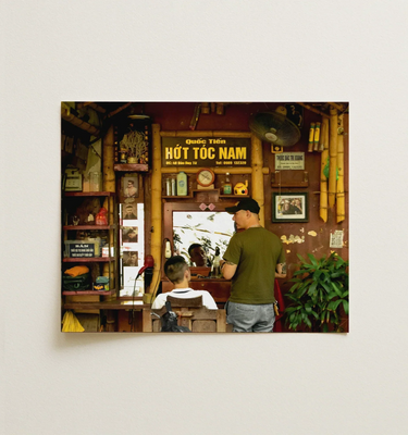 Small to Medium Wall Art, Framed canvas of a Vietnamese barbershop interior with vintage decor and signage.