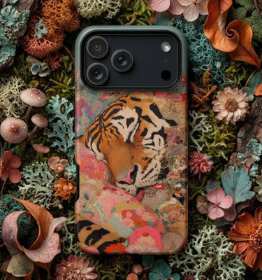 Tiger Phone Cases featuring a fierce tiger design on a phone case surrounded by natural elements.