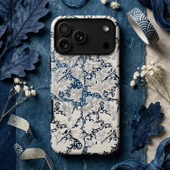Decorative william morris iphone case featuring intricate blue floral and bird pattern inspired by 19th-century artistic rebellion