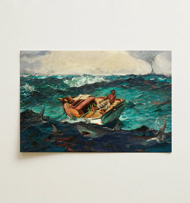 White-framed artwork of a wooden boat with two figures battling teal ocean waves and sharks from winslow homers collection
