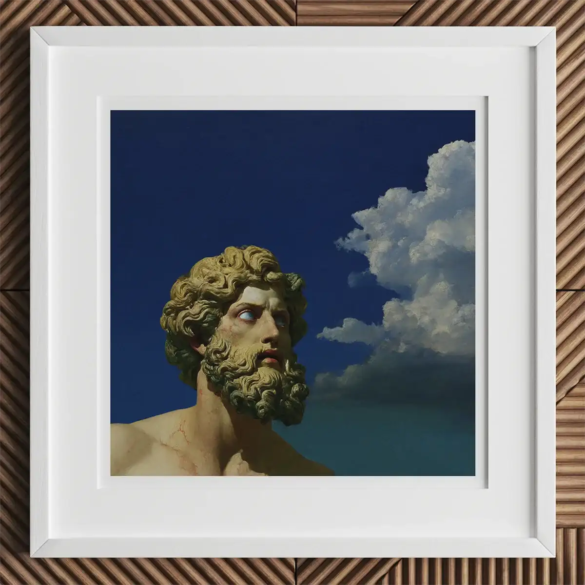 Framed statue head against blue sky representing mad genius and the tortured artist trope