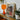 Hadrian & Antinous - Gay Interracial Couple Art Print, Framed Photograph Alongside Orange Table Lamp Potted Plant