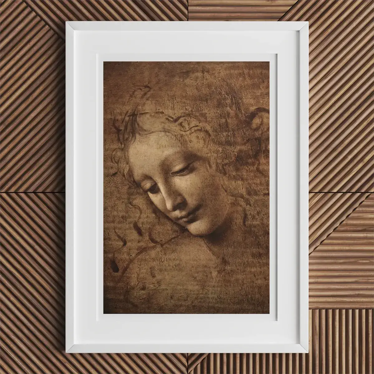 Framed drawing of a woman associated with Leonardo da Vinci in Clos Lucé exhibit
