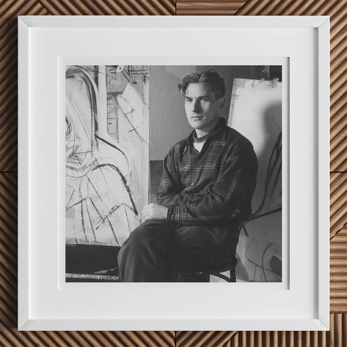 Framed black and white portrait of a male artist inspired by Andy Warhol, Louise Bourgeois, or Chuck Close