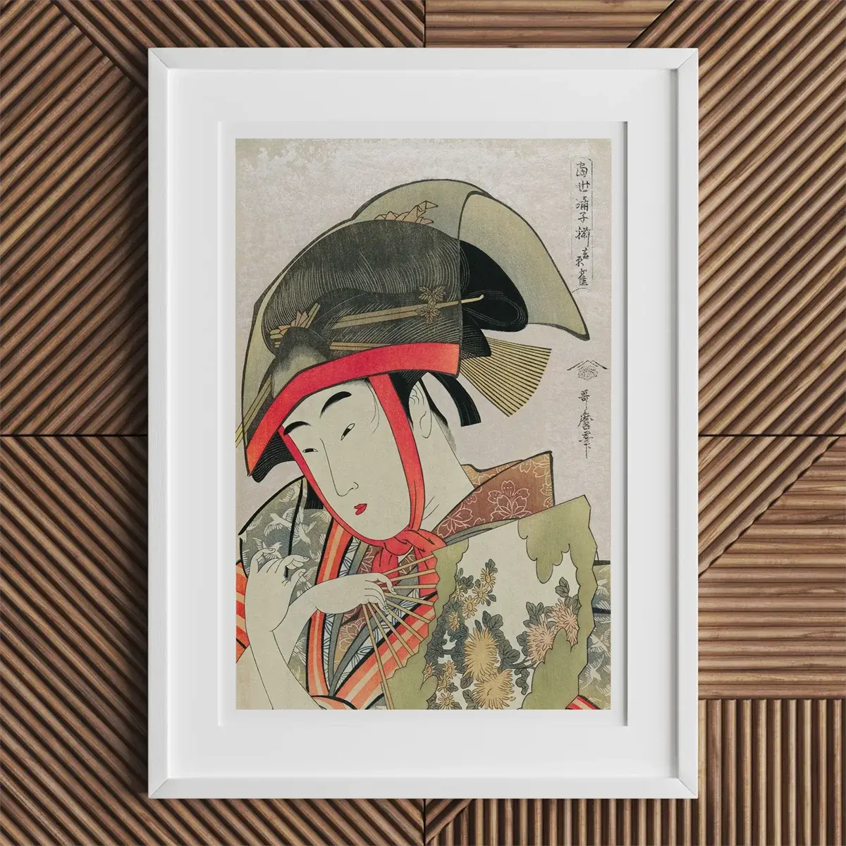 Framed Japanese woodblock print showcasing Kitagawa Utamaro’s ukiyo-e printmaking style