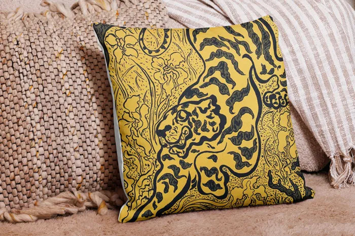 Decorative throw pillow featuring a bold yellow and black abstract floral pattern