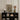 Sleek Black Cube Unit Books Decorative Stones Minimalist Goya Art Print, Bodies Pile, Moving Carcass