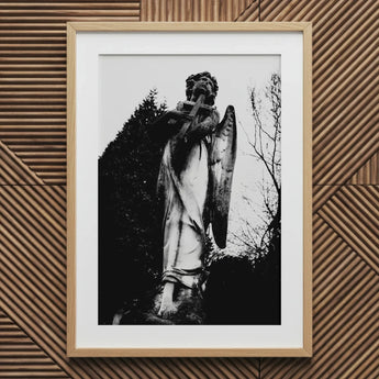 Archangel Holding Cross Art Print, 20x30’’ / 51x76cm / Natural Frame / 2’’ Matboard, Framed Black White Photograph Angel Statue