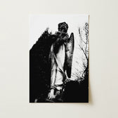 Black-and-white Photograph Weathered Stone Angel Statue Cross Detailed Figure Carved