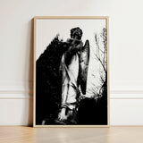 Black-and-white Framed Photograph Weathered Stone Angel Statue Cross Figure Carved