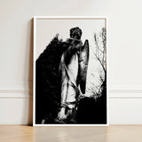 Black-and-white Framed Photograph Weathered Stone Angel Statue Cross Figure Carved