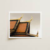 Framed Photograph Traditional Thai Temple Roof Ornate Golden Cambodian Photography, Temple’s Embodies Timeless Grandeur, Brooding Sky Over