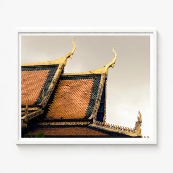 Framed Photograph Ornate Golden Roof Tiles Intricate Curved Cambodian Temple Photography, Temple’s Embodies Timeless Grandeur, Brooding Sky