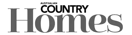 Black and white text logo for ’Australian Country Homes’ magazine with stylized typography.