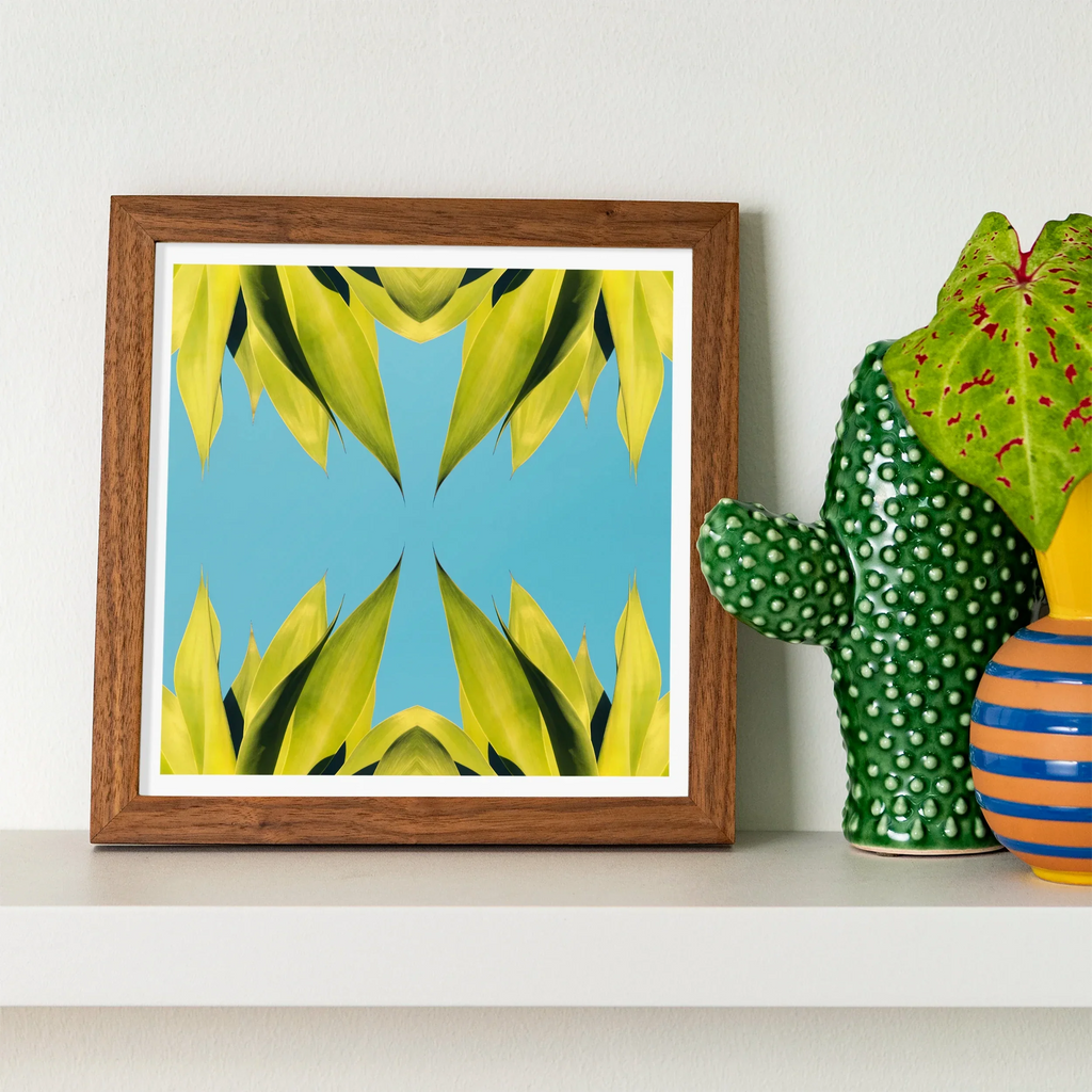 Framed abstract artwork of symmetrical botanical op art featuring a trippy tree trunk design