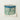 Vintage-style Cylindrical Hatbox Teal White Floral Pattern Accented Decorative 1930s Decor, Art, Bygone Elegance