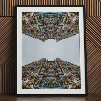 Op art print of South Indian temple deities, framed.