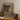Framed Vintage-style Painting Figure Traditional Attire Lush Plants Carlo Ascenzi Art, Echo Clings, Ochre Walls