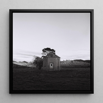 Lonely Brick House Art Print / Canvas Black-framed Black-and-white Photograph Stone Tree with Muted Silver, Blank Sky Cloud Cover, Light