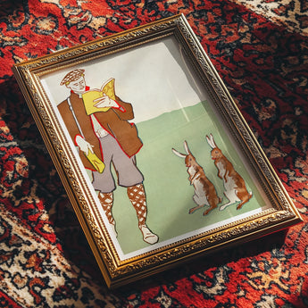 Man Reading a Book with Hares - Edward Penfield Art Print, Framed Artwork Golfer Vintage Attire Two Rabbits Nearby