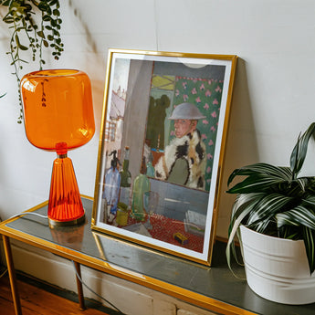 Ready to Start - William Orpen Art Print, Framed Photograph Alongside Orange Glass Table Lamp Potted