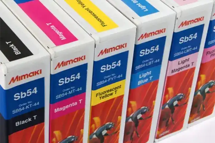 Row of Mimaki Sb54 printer ink cartridges in different colors.