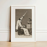 Those Specks of Dust - Francisco De Goya Art Print / Canvas Framed Black-and-white Lithograph Figure Ornate Pointed Hat Seated Dissects,
