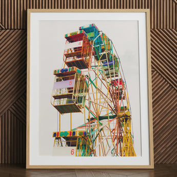 Vibrant Ferris wheel art print framed.