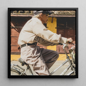 Wild at Heart - Hoi an Photography Framed Canvas, 12x12’’ / 31x31cm / Black Floating Frame, Man Bicycle Light-colored Clothing Cap