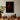 Framed Artwork Figure Draped Deep Red Fabric Dark Crimson Mantle Catches, Reflection Multiplies, a Veil, Dim Light Folds Gathering